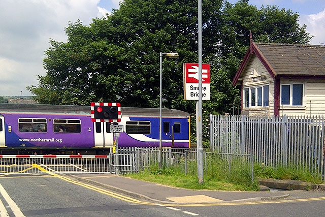 Smithy Bridge level crossing with the now-demolished signal box