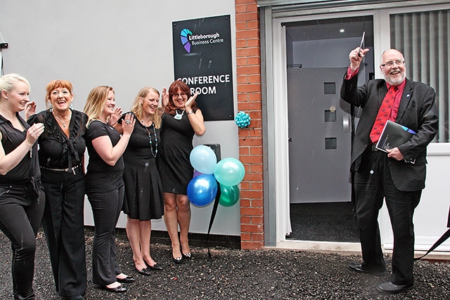 Rochdale Online Director John Kay cuts the ribbon to officially open Littleborough Business Centre