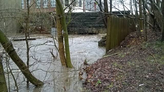 The river under College Road near junction with Mellor Street/Bury Road