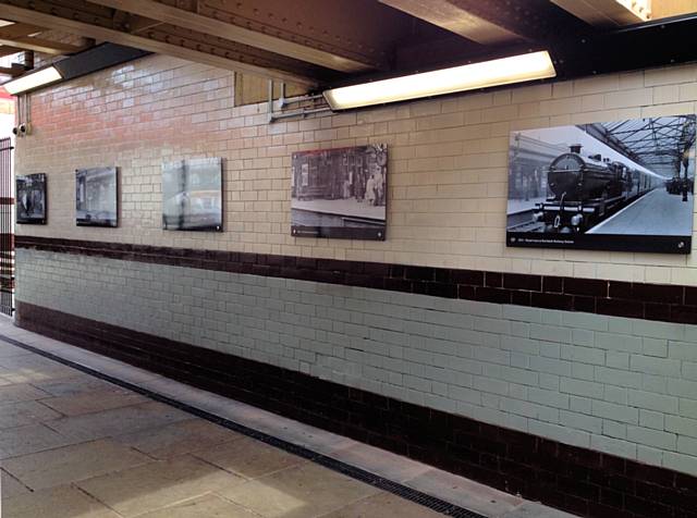 Pictures of the original station are displayed on the walls of the subway
