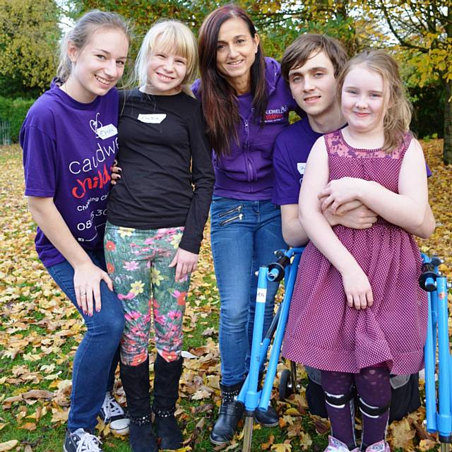 CEO of Caudwell Children, Trudi Beswick (centre), with volunteers and participants on the charity's Summer Activity Club in Rochdale in August