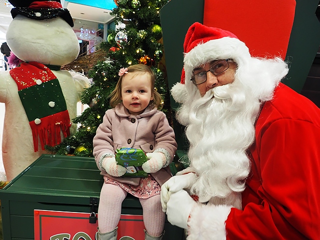 Amelia Ramsbottom meets Santa in the Rochdale Exchange Shopping Centre Grotto