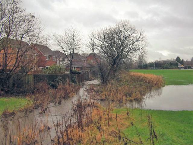 The field itself (Heritage Green), which is almost opposite across Shearing Avenue, was covered in water 