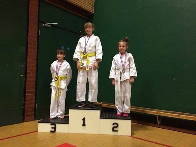 Ebony Smith from Rochdale Judo Club receiving her Silver medal