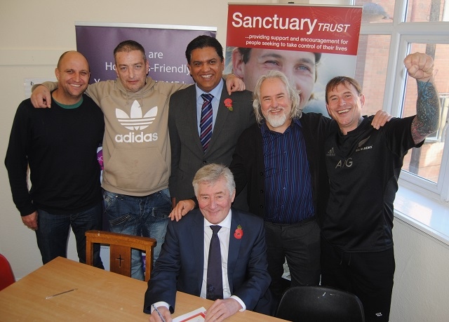 Front: Tony Lloyd MP with Dr Zahid Chauhan and David Lackner-Smith, Chief Executive Officer, The Sanctuary Trust, and service users