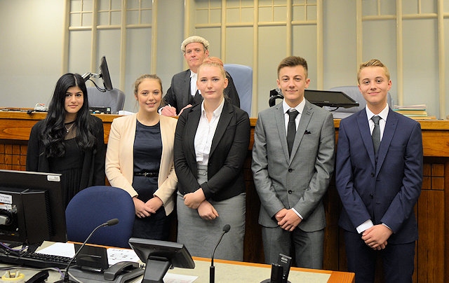Rochdale Sixth Form College students with a High Court Judge at Manchester Law Court