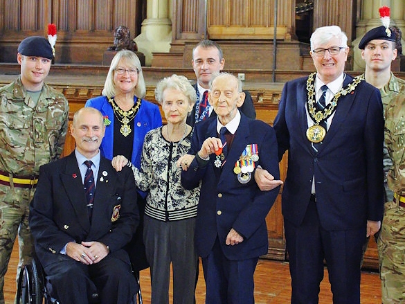 Former Mayor Ian Duckworth, presents William Wild with the prestigious Légion d’honneur medal 