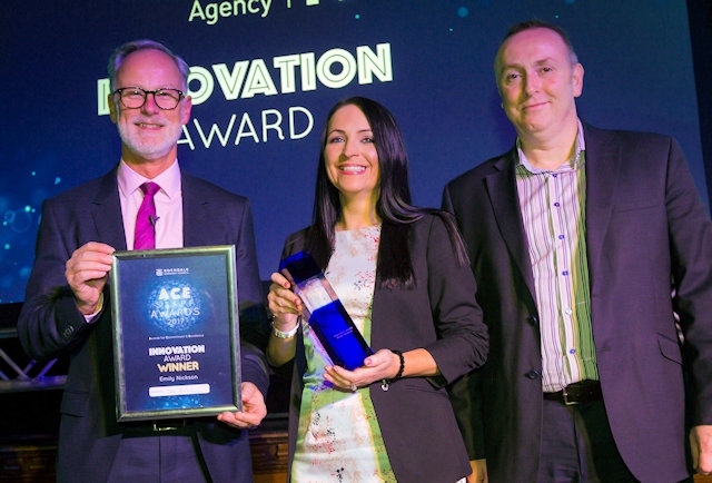 Emily Nickson is presented with the Innovation Award by John Searle from Rochdale Development Agency alongside council Chief Executive Steve Rumbelow