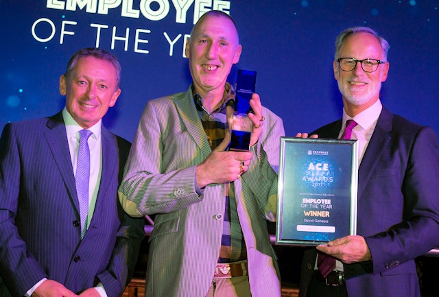 David Genesis picks up the Employee of the Year Award from Gary Duckworth of Cooney Civil Engineering with Chief Executive Steve Rumbelow