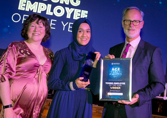 Ruhena Begum receives the Young Employee of the Year Award from Claire Nangle at Keepmoat Homes alongside council Chief Executive Steve Rumbelow