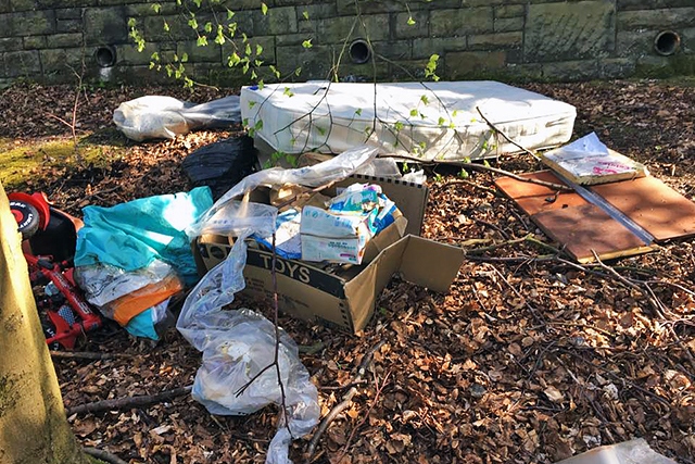 Rubbish has been dumped on Woodland Road