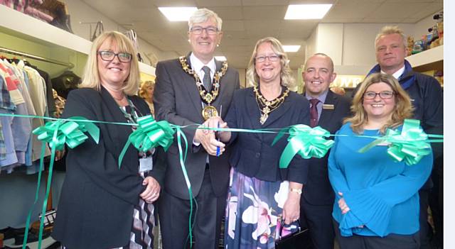 Reopening the Yorkshire Street shop, left to right, Hospice Chief Executive Julie Halliwell, the Mayor and Mayoress Ian and Christine Duckworth, M&S Manager Chris Parker, Hospice Retail Manager Suzanne Ryder and Gary Pilkington from Rochdale Council