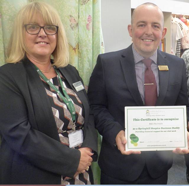 Julie Halliwell presents Chris Parker with honorary membership of the Hospice’s Business Buddies scheme