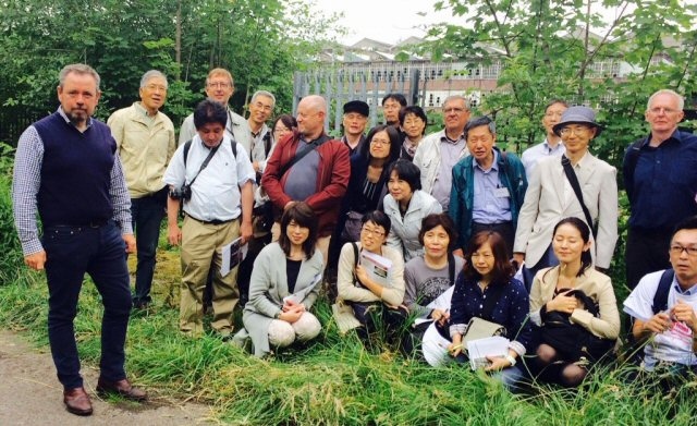 International delegation at former TBA site in the Spodden Valley