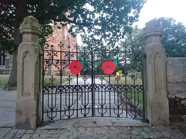 'Town' poppies at the gates of St Leonard's Church