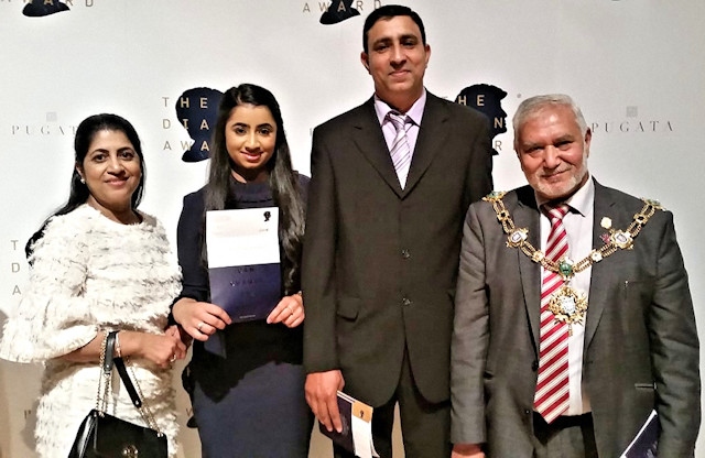 Sarah Mahmood with her parents and the Mayor of Rochdale