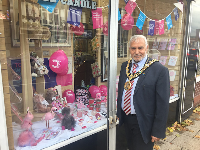 The Mayor in Heywood, judging a pink window display