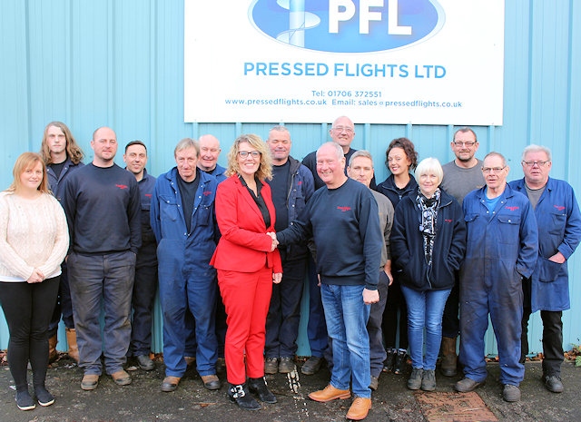 Managing director Mark Cryer and his team is thanked Charity Trustee Helen Walton at Pressed Flights Ltd for their donation to this year’s Christmas Toy Appeal