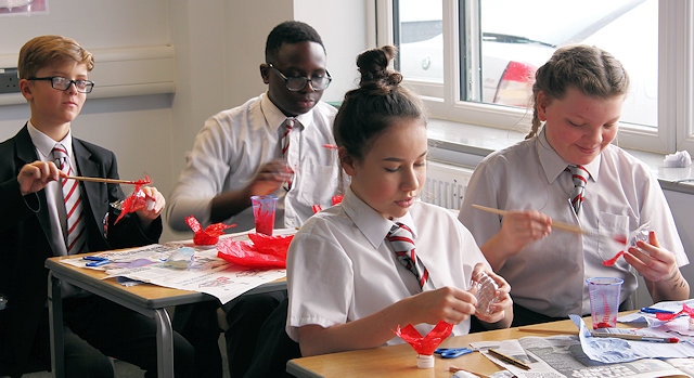 Year 9 creating poppies from plastic water bottles 