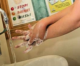 Wash hands thoroughly and regularly at all times, but particularly after using the toilet and before eating