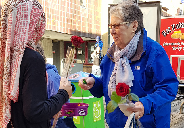 300 roses were given out to the public