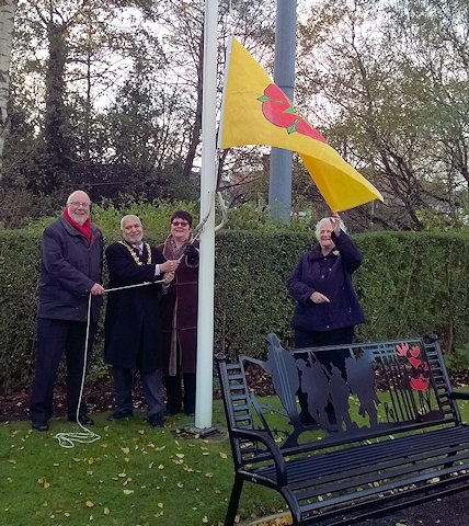 Mayor Mohammed Zaman at Lancashire flag at Littleborough Cenotaph