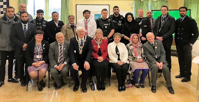 The Mayor and Mayoress of Rochdale with community members, councillors, officers from Greater Manchester Police, Crime Commissioner's Office and Rochdale Council at Deeplish Community Centre