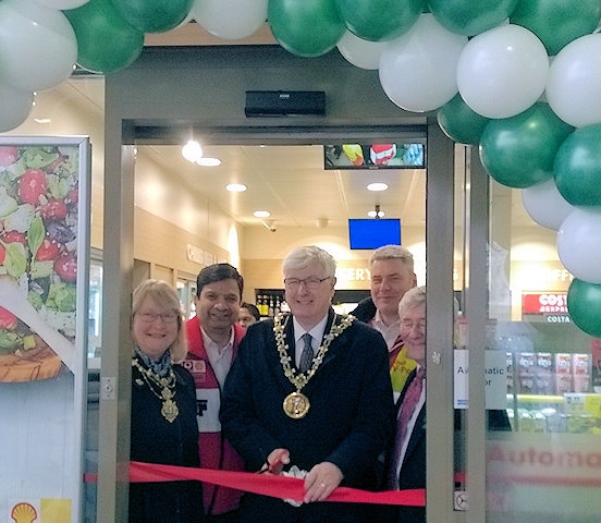 Mayor and Mayoress, Ian and Christine Duckworth with Tony Lloyd MP and Mr Faisal Rana opening the new 'Budgens at Shell' store