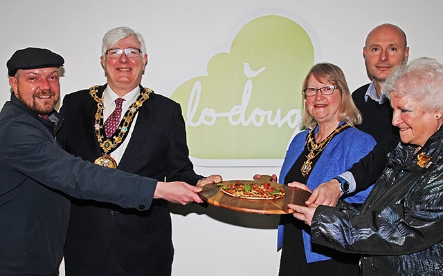 Lo-Dough co-founders Ben Holden and Rob Wales share a 250 calorie pizza with the Mayor and Mayoress and Councillor Ann Stott