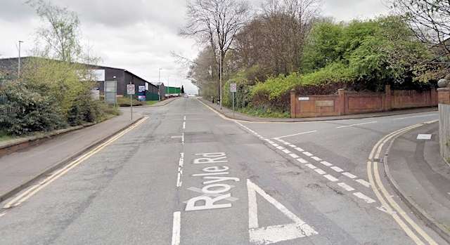 Entrance to The Green, off Royle Road, on the right, with the entrance to the Industrial Estate on the left