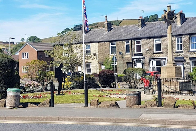 A soldier watches over the cenotaph at Norden