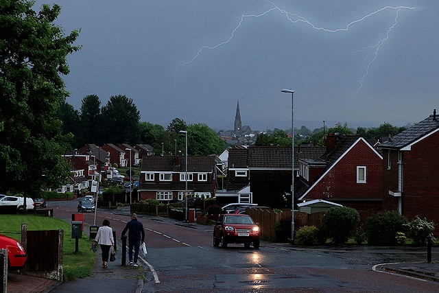 Take care when travelling in heavy rain, wind and thunderstorms. (Pictured: lightning above Heywood, June 2018)
