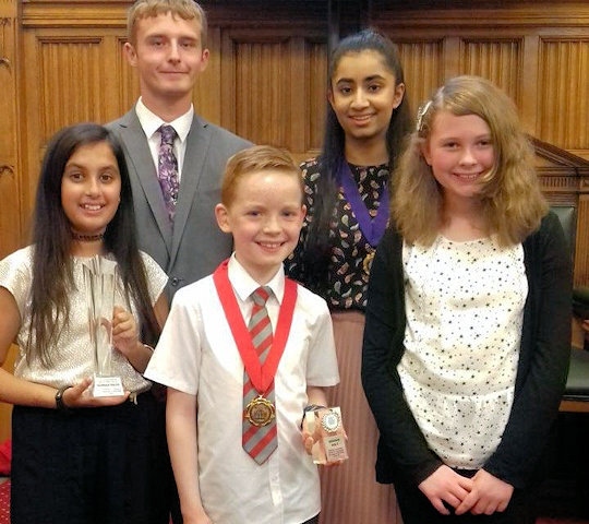George Holt (centre), the outgoing Children’s Champion for Rochdale