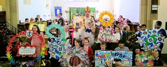 St Peter’s children attend a service at St Michael’s Church