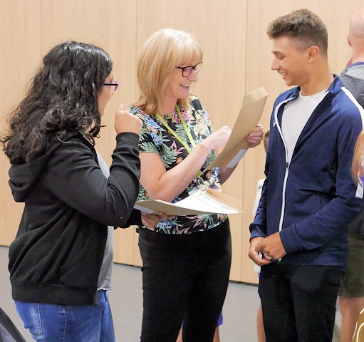 Staff and students at Wardle Academy celebrating exam results