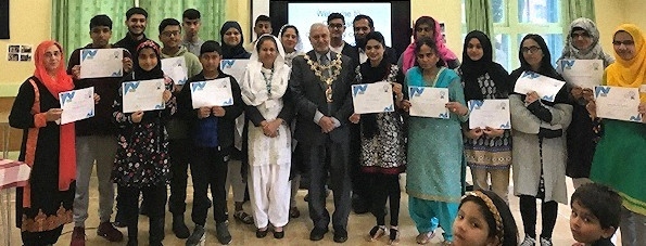 Mayor Mohammed Zaman presents certificates at Deeplish Community Centre

