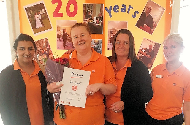 Karen Wright with her long service award for her 20 years’ service at the Carders Court Care Home 