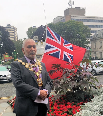 Mayor Mohammed Zaman at the flag raising for Merchant Navy Day