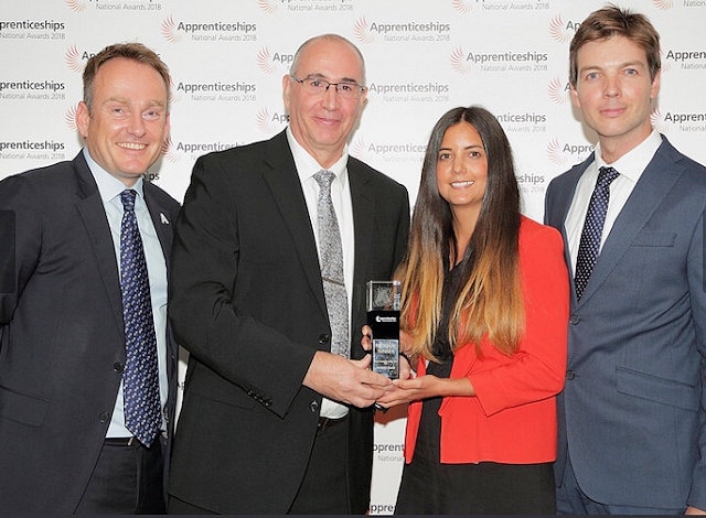 Andy Turner and Toni Carter (centre) receiving the award for Macro Employer 
