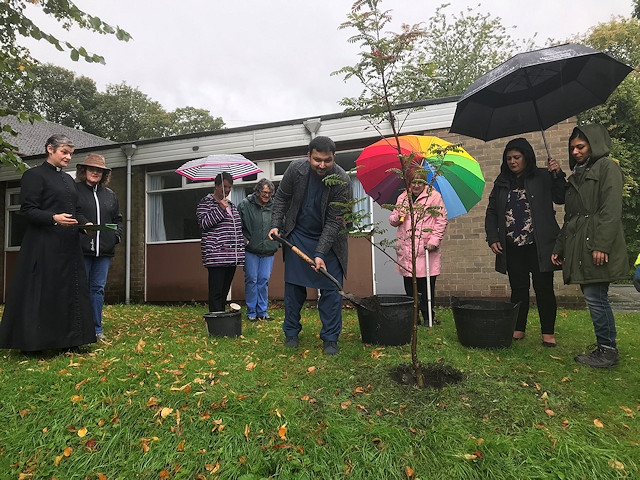 Planting the tree at St George Church, Oakenrod