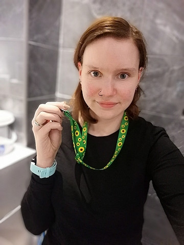 Victoria Whiting, aka 'Aspling', with a sunflower lanyard