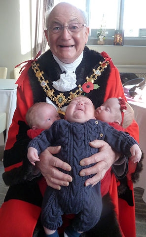 Mayor Billy Sheerin with the triplets in the Clock Tower Dining Room