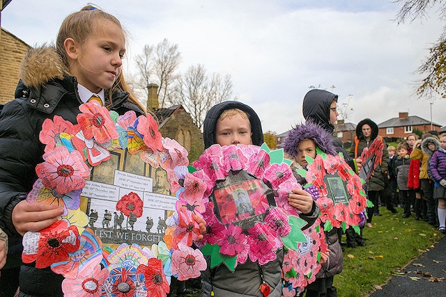 Pupils from Milnrow Parish CE Primary School at the war memorial