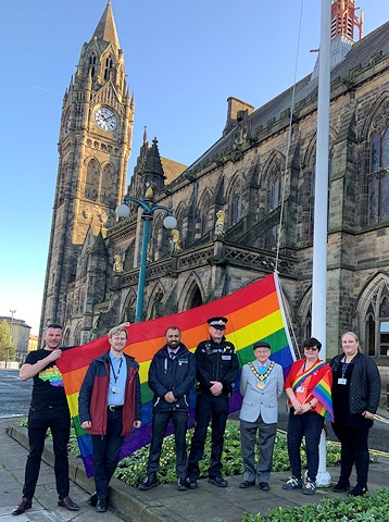 Rainbow flag raising for the start of Rochdale in Rainbows presents Pride