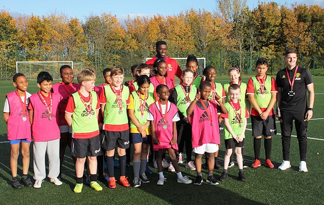 Axel Tuanzebe during a PE lesson with young pupils from his former primary school, St. John’s