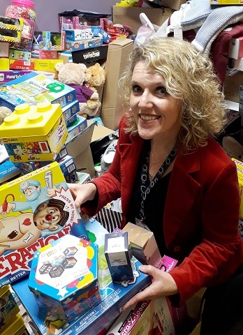 Giving Back Charity Member Helen Walton with some of the donated presents