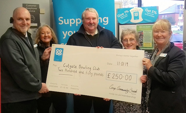 Steve Parkinson, Co-op Food Store Manager: Bev Place, Pioneer Member; Duncan Heath and Kath Sharp, Cutgate Bowling Club and Bobbie Jones, Co-op Funeralcare