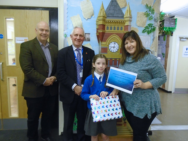 Councillors John Taylor, Ashley Dearney and Rina Paolucci present Imogen with her prize and certificate