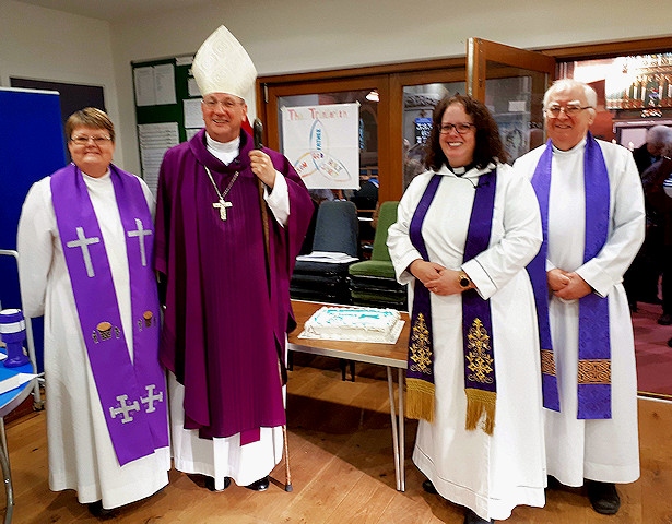 Bishop Mark is pictured with the vicar of St Andrew's, the Rev Rachel Battershell and other members of the church's ministerial team