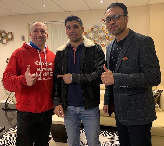 Boxer Muhammad Ali has signed a new sponsorship with Pain Solutions, pictured with CEO of Pain Solutions, Timothy Case, and manager Asad Shamim